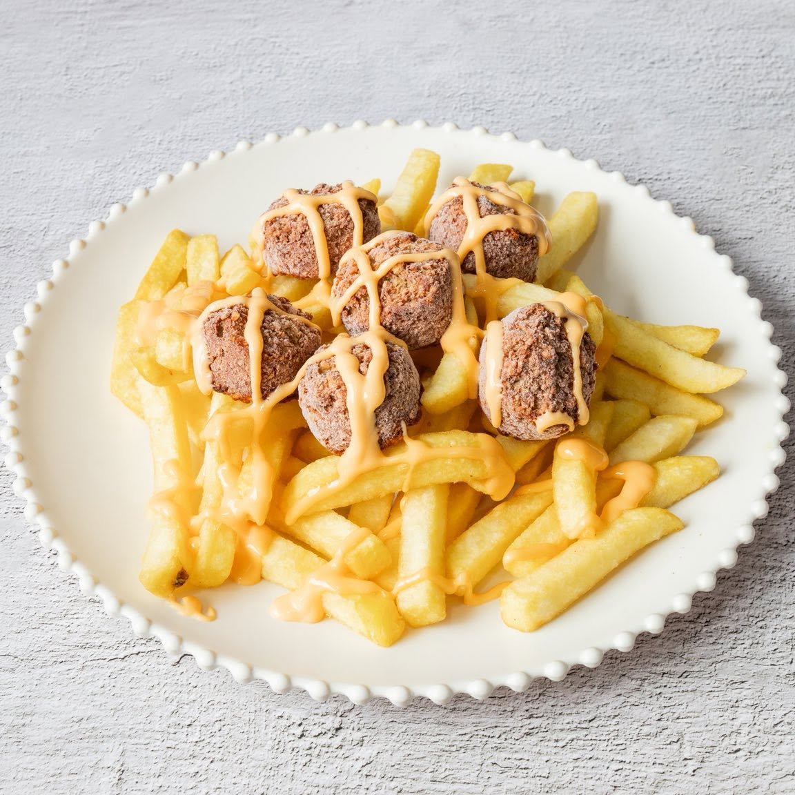 Mr Gyros in Glasgow’s golden french fries with toppings.