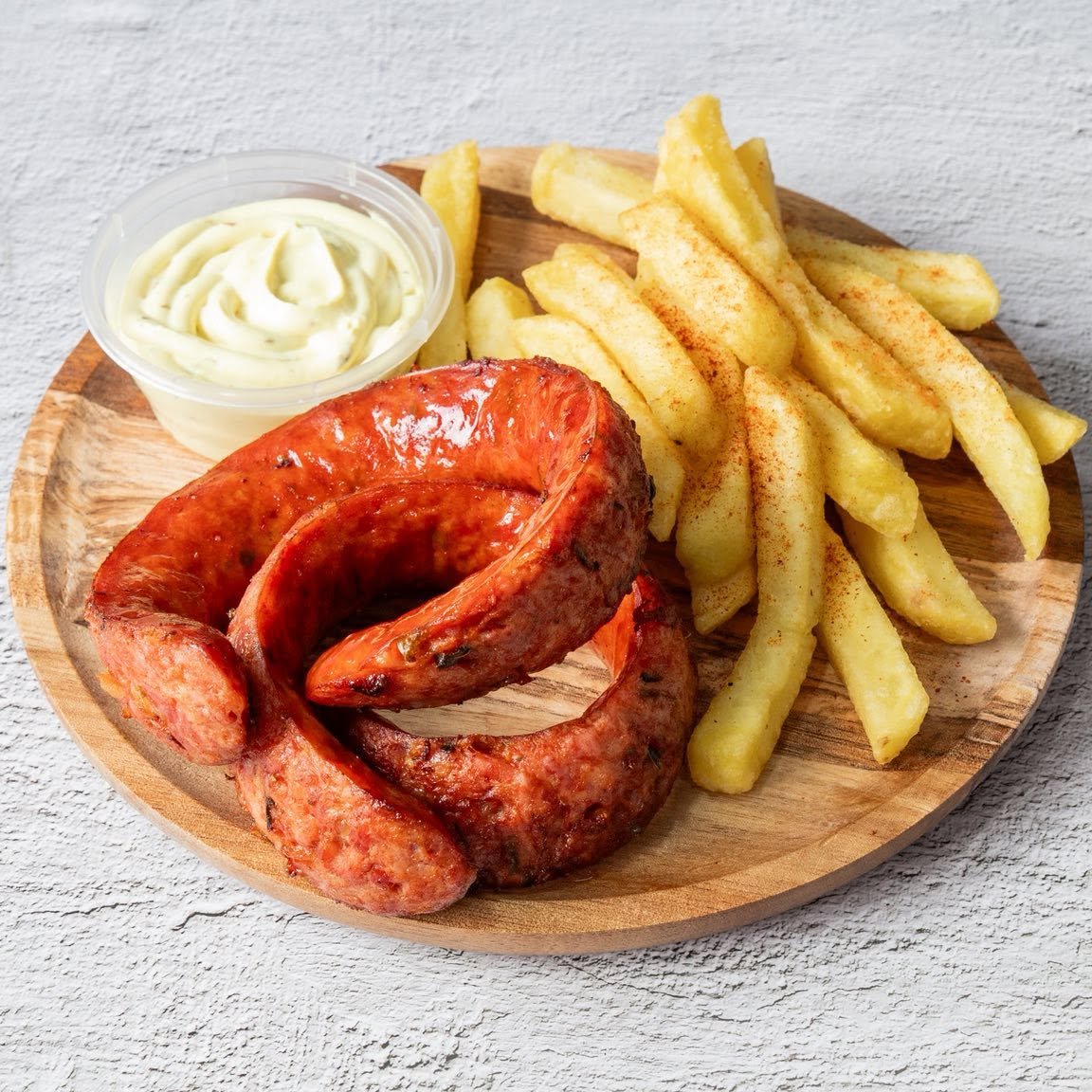 Mr Gyros in Glasgow grilled Greek sausage served with seasoned french fries and a side dip.